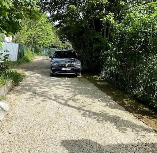 Appartamento Maison Jardin Et Parking Gratuit - 10 Min De L'aeroport - Metro 14 - Arrivee Autonome